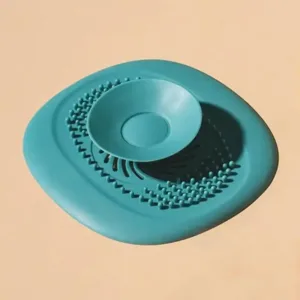 Filtre anti cheveux pour évacuation d'eau de douche avec ventouse centrale, disponible en plusieurs couleurs au Maroc.